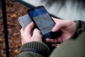 Geolocation App On Mobile Device With Gps Map Interface