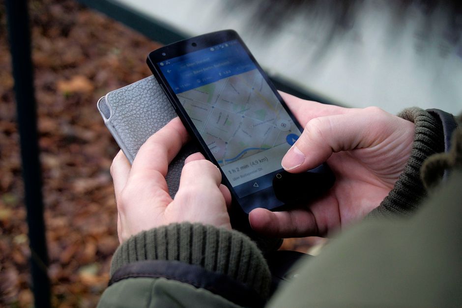 Geolocation App On Mobile Device With Gps Map Interface
